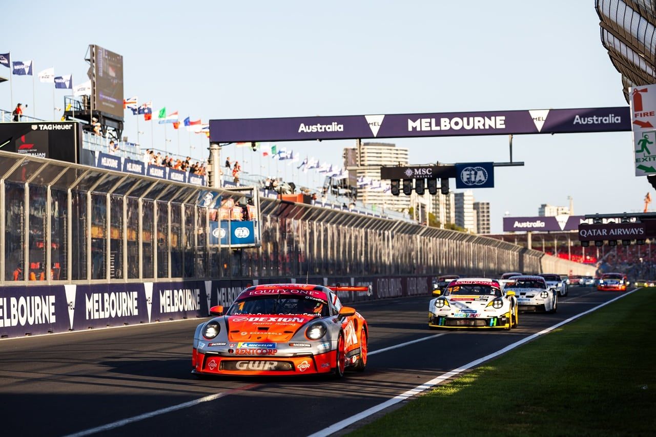 Dexion Porsche 911 GT3 Cup car on the main straight at Albert Park with other Carrera Cup cars behind