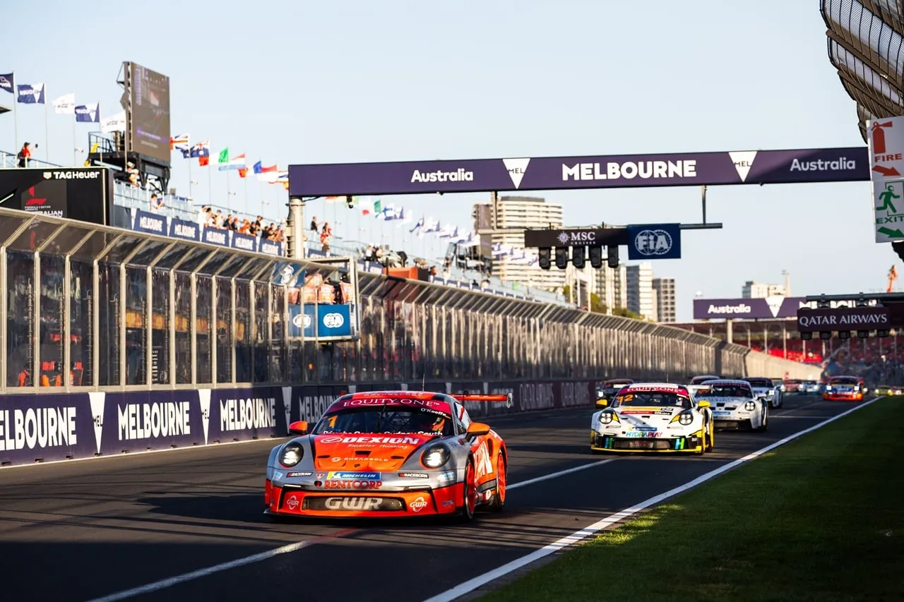 Dexion Porsche 911 GT3 Cup car on the main straight at Albert Park with other Carrera Cup cars behind