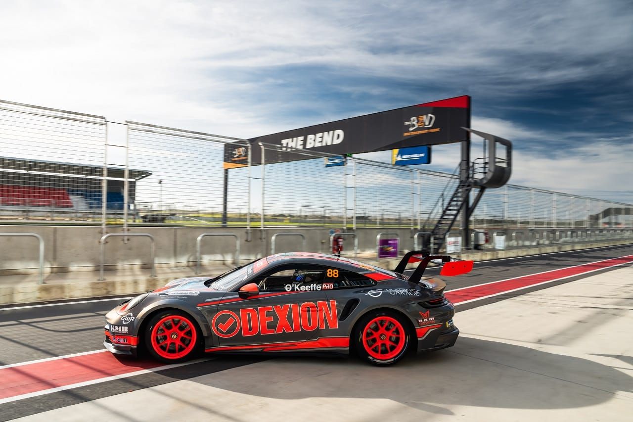 The number 88 Dexion Porsche 911 GT3 Cup car in the pit lane exit at The Bend during a test day