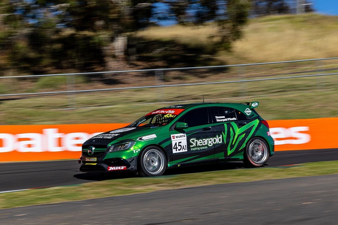 A green Sheargold Mercedes A45 AMG, race number 45, on track at Mount Panorama