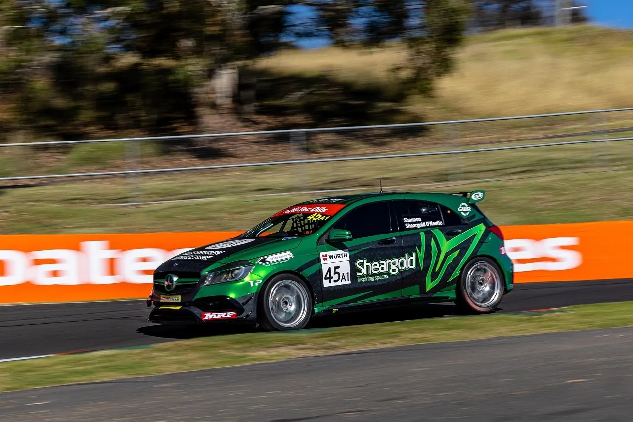 A green Sheargold Mercedes A45 AMG, race number 45, on track at Mount Panorama