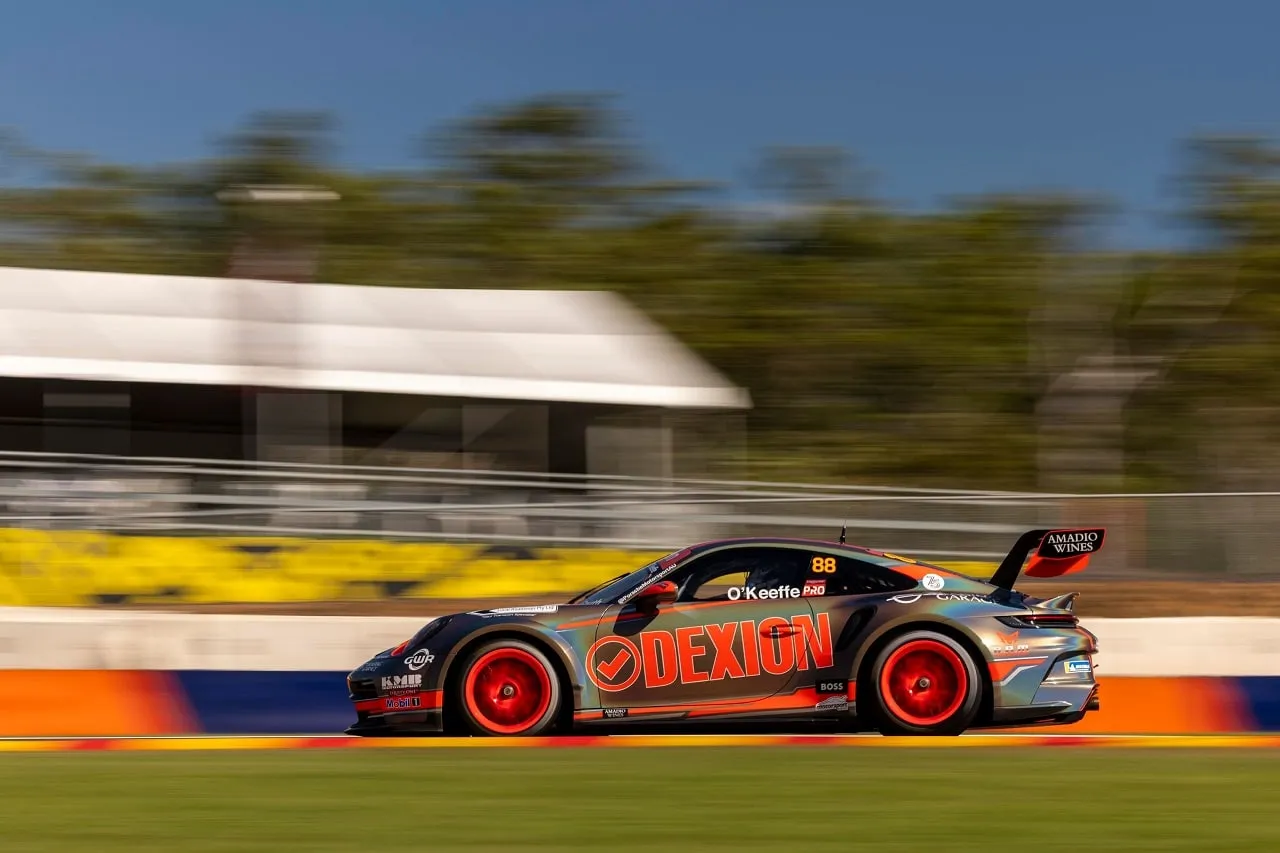 Side view of the number 88 Dexion Porsche 911 GT3 Cup car at speed at Hidden Valley in Darwin
