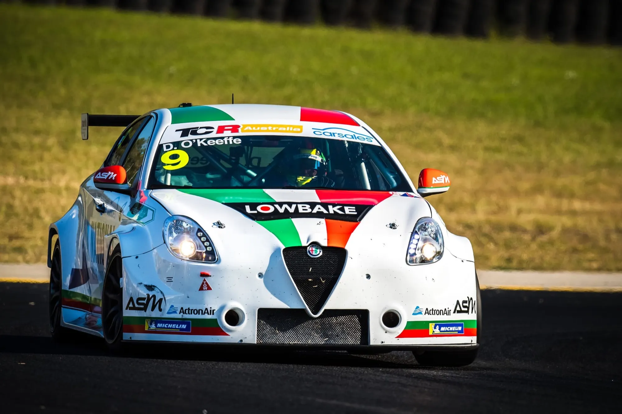Front view of Dylan O’Keeffe’s #9 Lowbake Alfa Romeo Giulietta TCR car on track
