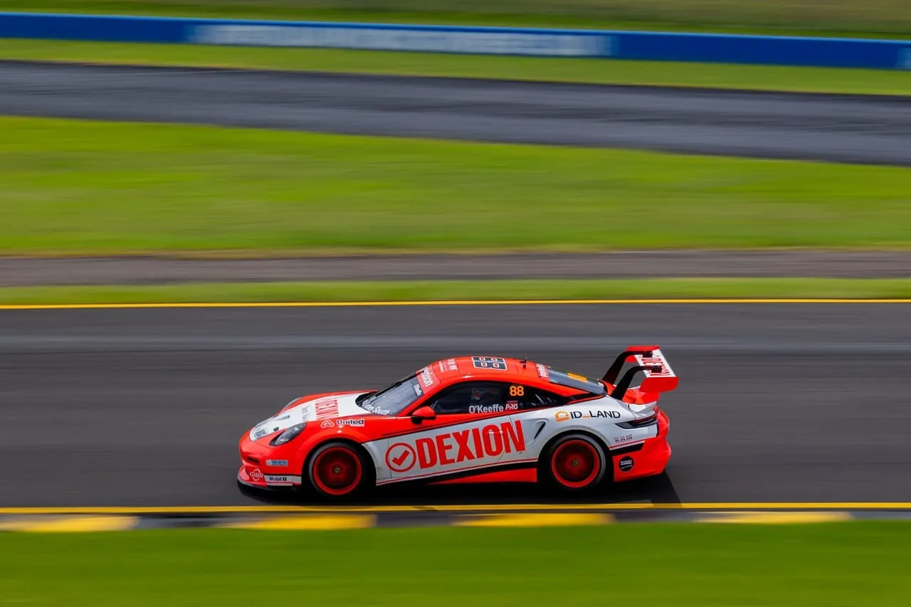 Dexion Porsche #88 speeding past in side view with motion blur