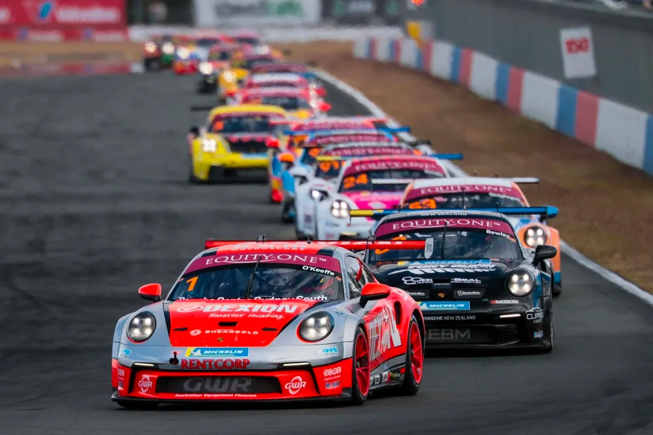 Dexion Porsche 911 GT3 Cup car #1 leading a pack of Carrera Cup cars on track