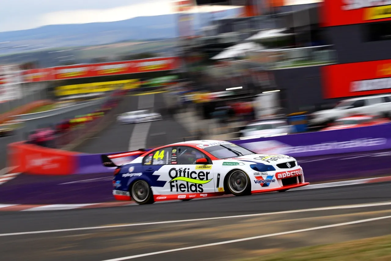 The #44 Officer Fields apbgroup Commodore Supercar at speed on the Mount Panorama circuit