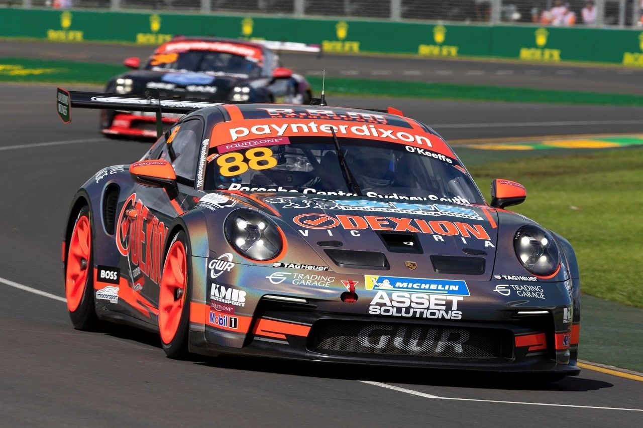 The number 88 Dexion Porsche 911 GT3 Cup car racing at Albert Park with another car behind