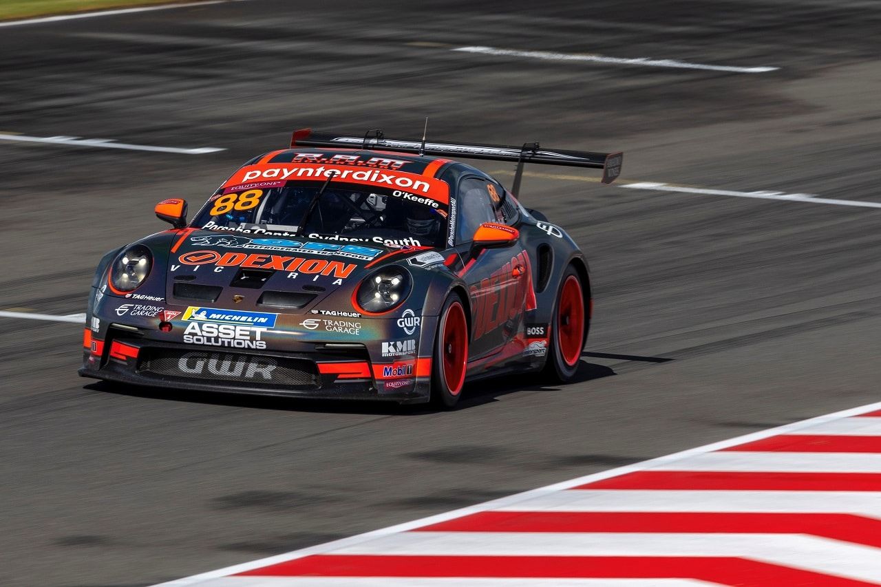 The number 88 Dexion Porsche 911 GT3 Cup car in the sun on track at The Bend