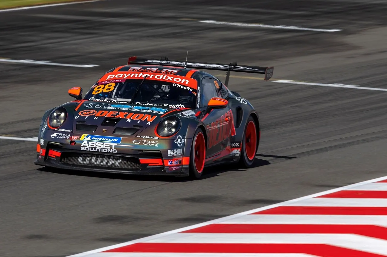 The number 88 Dexion Porsche 911 GT3 Cup car in the sun on track at The Bend