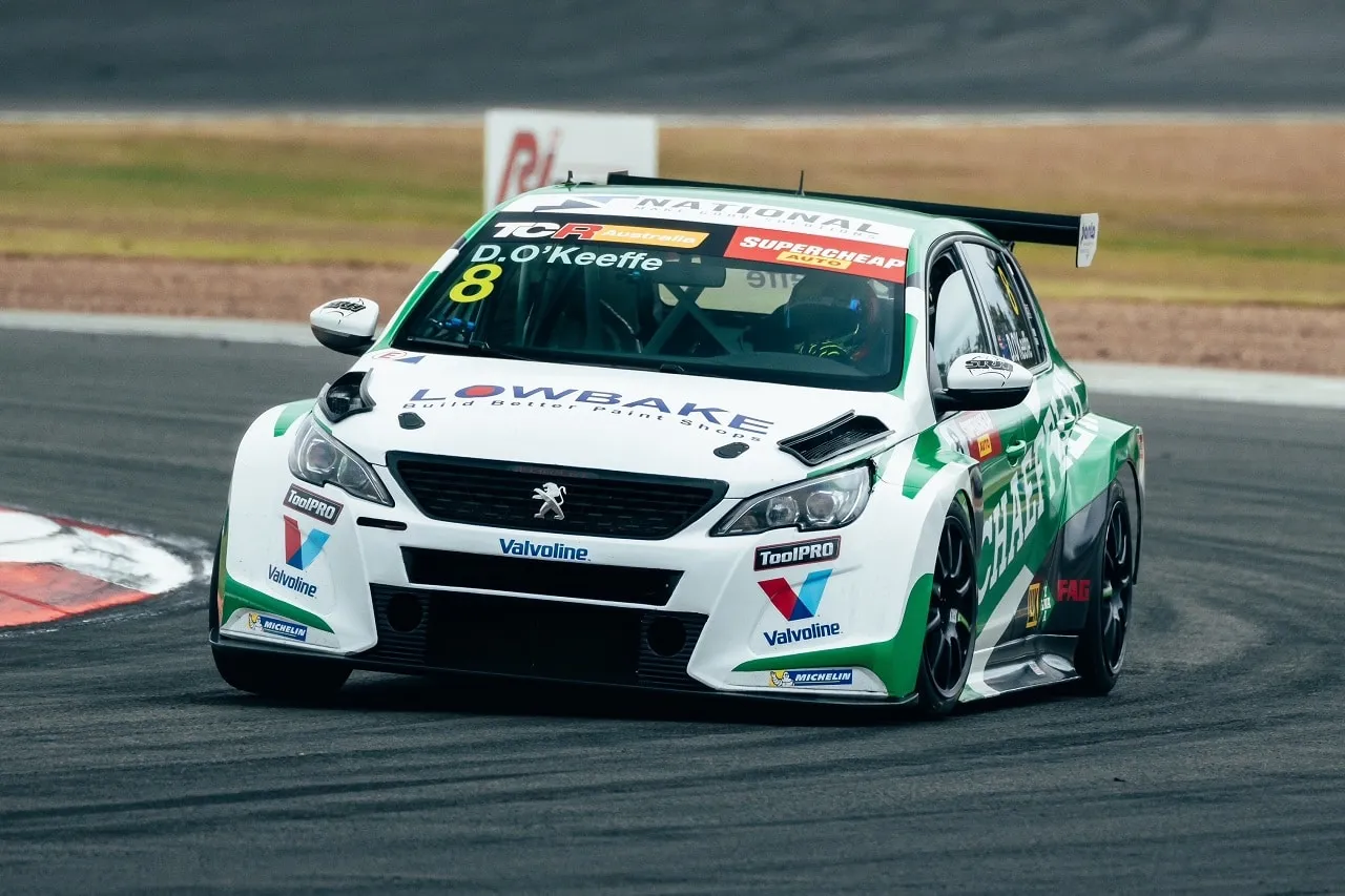 The #8 Schaeffler Peugeot 308 TCR car cornering on track