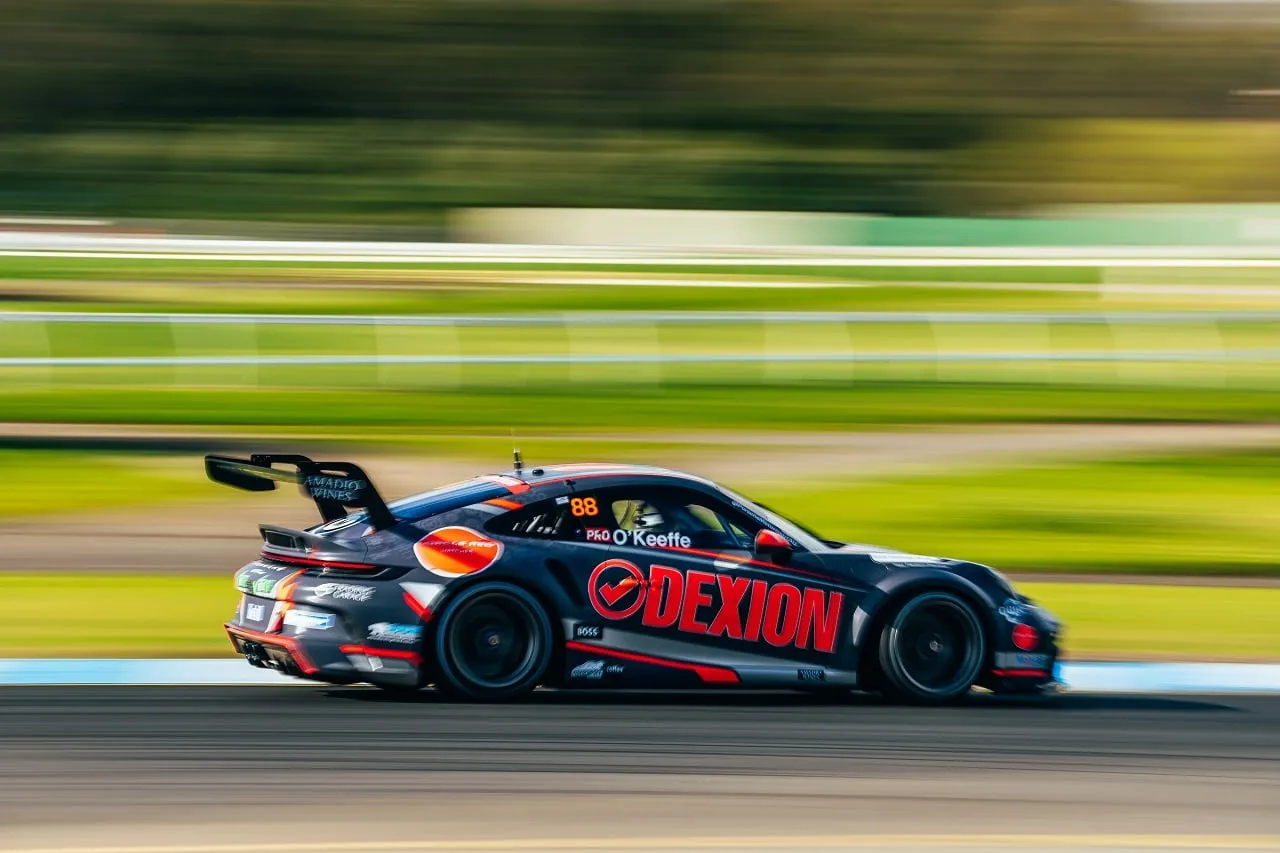 The #88 Dexion Porsche GT3 Cup car in side profile with motion blur