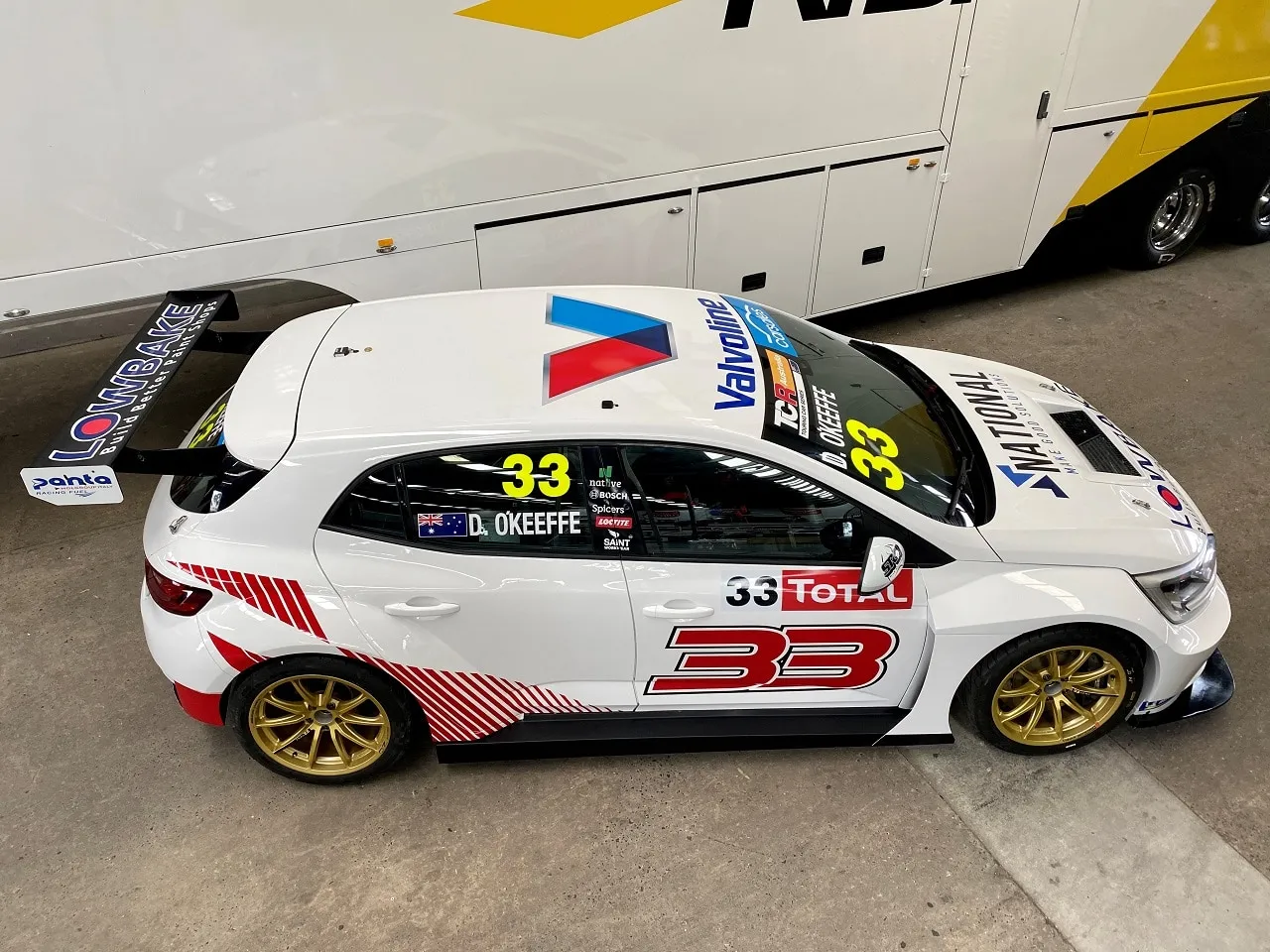 Overhead view of the white #33 Renault Megane RS TCR car with Valvoline, National and Lowbake sponsors