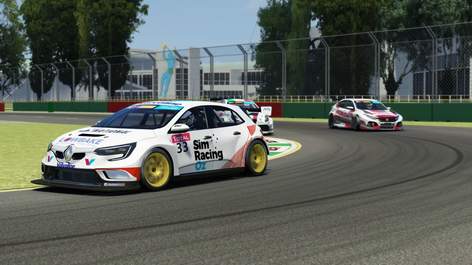 Sim racing screenshot of the white #33 Sim Racing Oz Renault TCR car rounding a corner with a Honda Civic behind