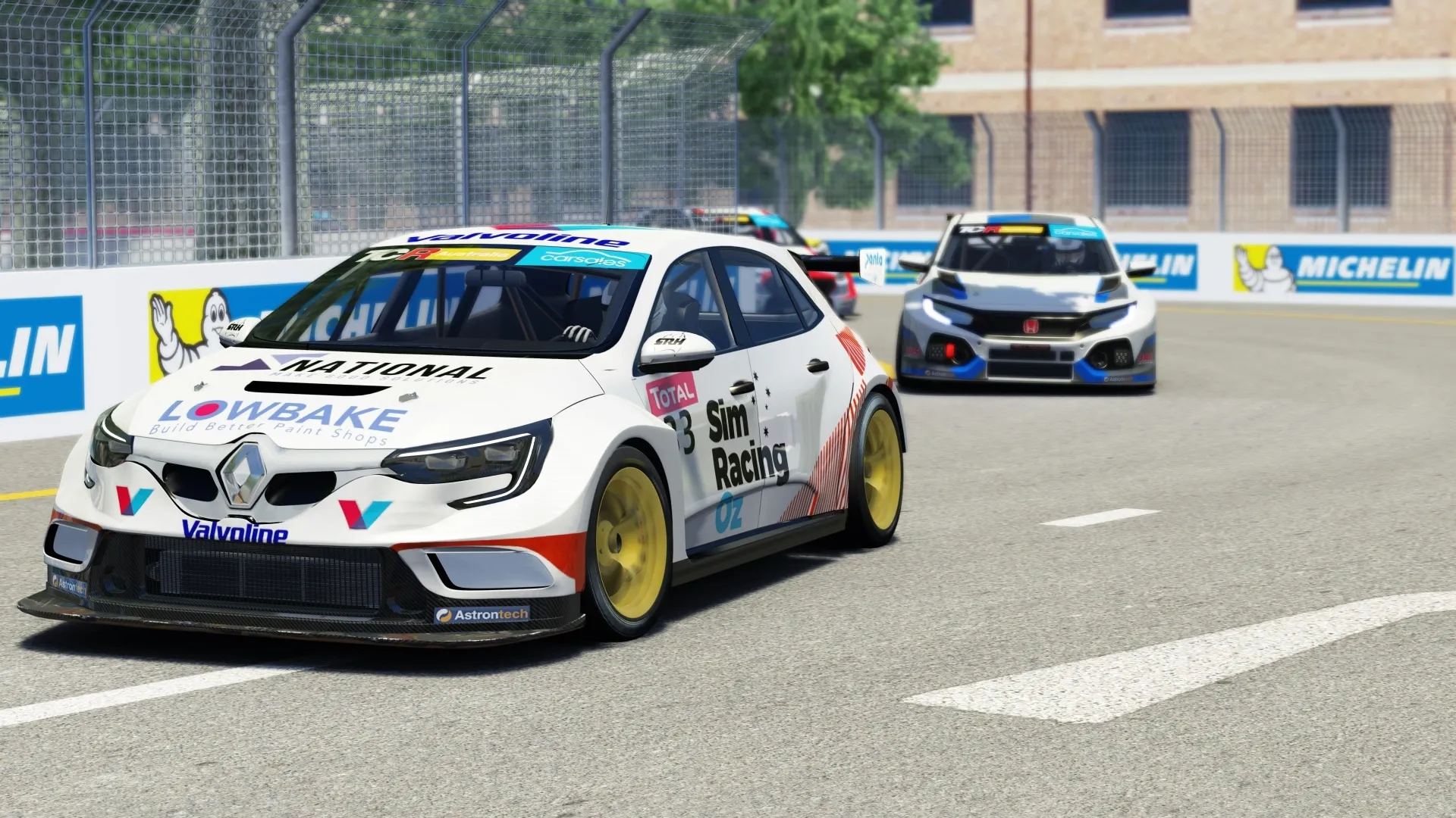 Sim racing screenshot of the white #33 Sim Racing Oz Renault Megane TCR car racing a Honda Civic on a street circuit