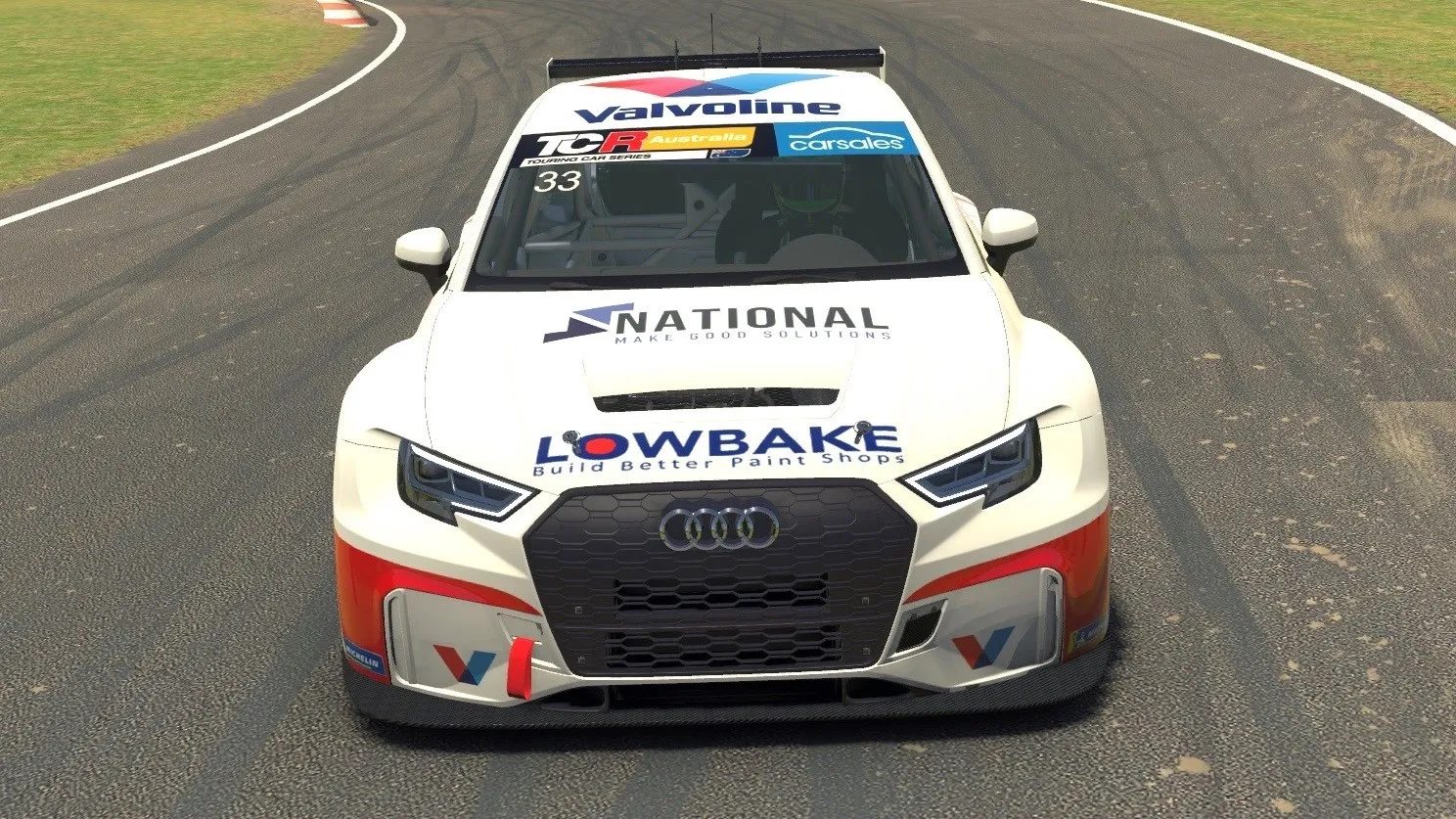 Sim racing screenshot of the front of the white #33 Lowbake Audi RS3 TCR car on track