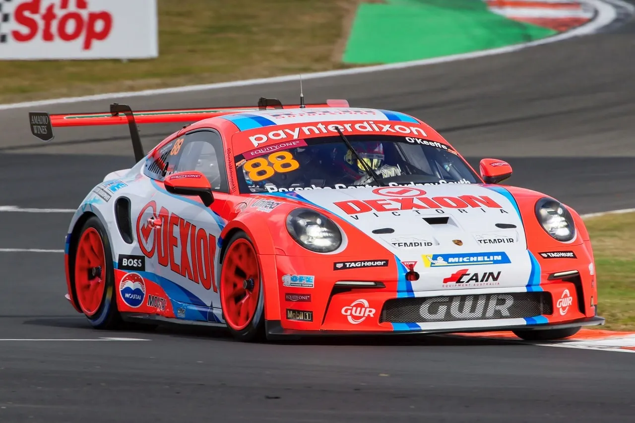 Close-up front view of the number 88 Dexion Porsche 911 GT3 Cup car cornering