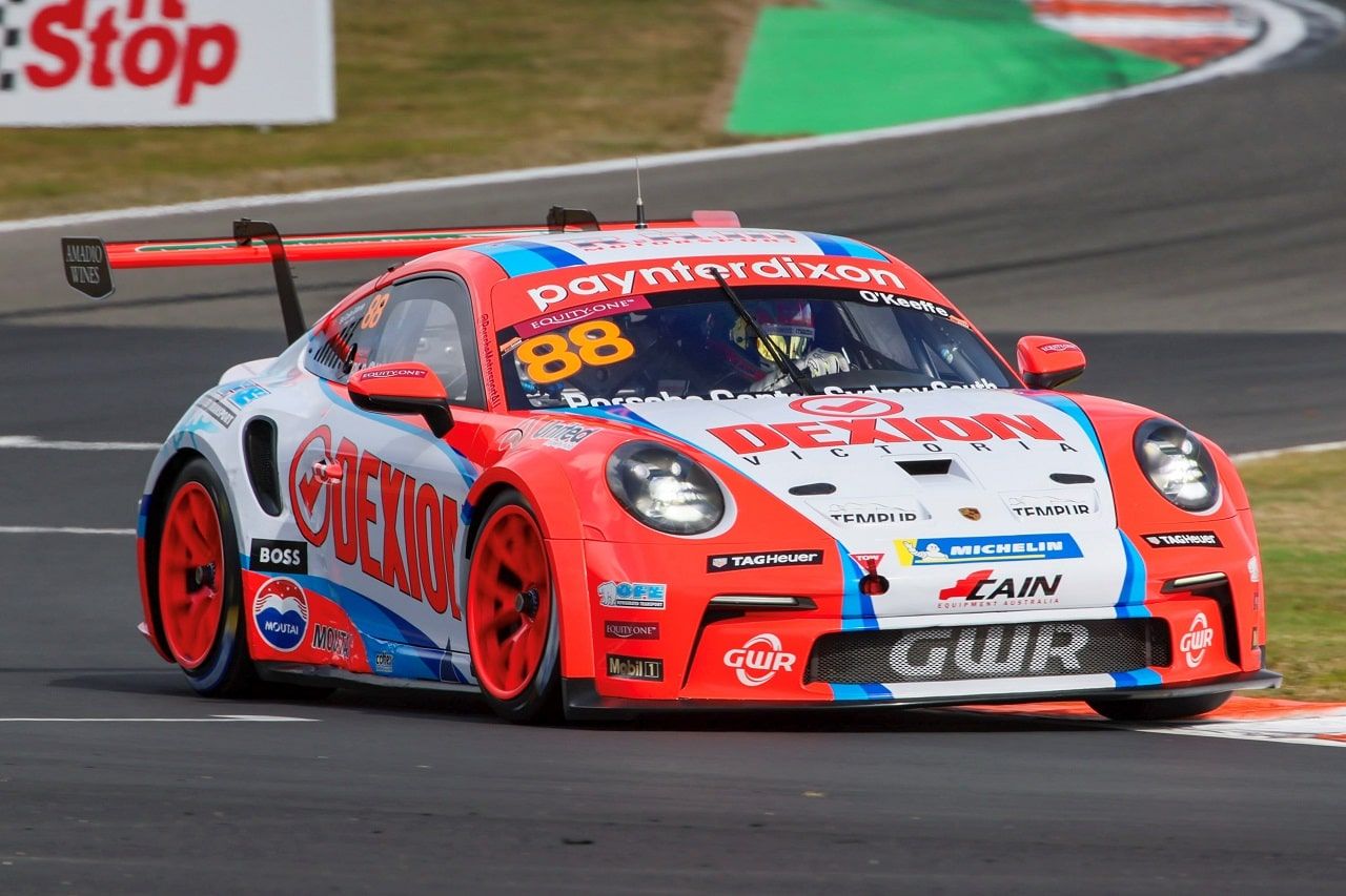 Close-up front view of the number 88 Dexion Porsche 911 GT3 Cup car cornering