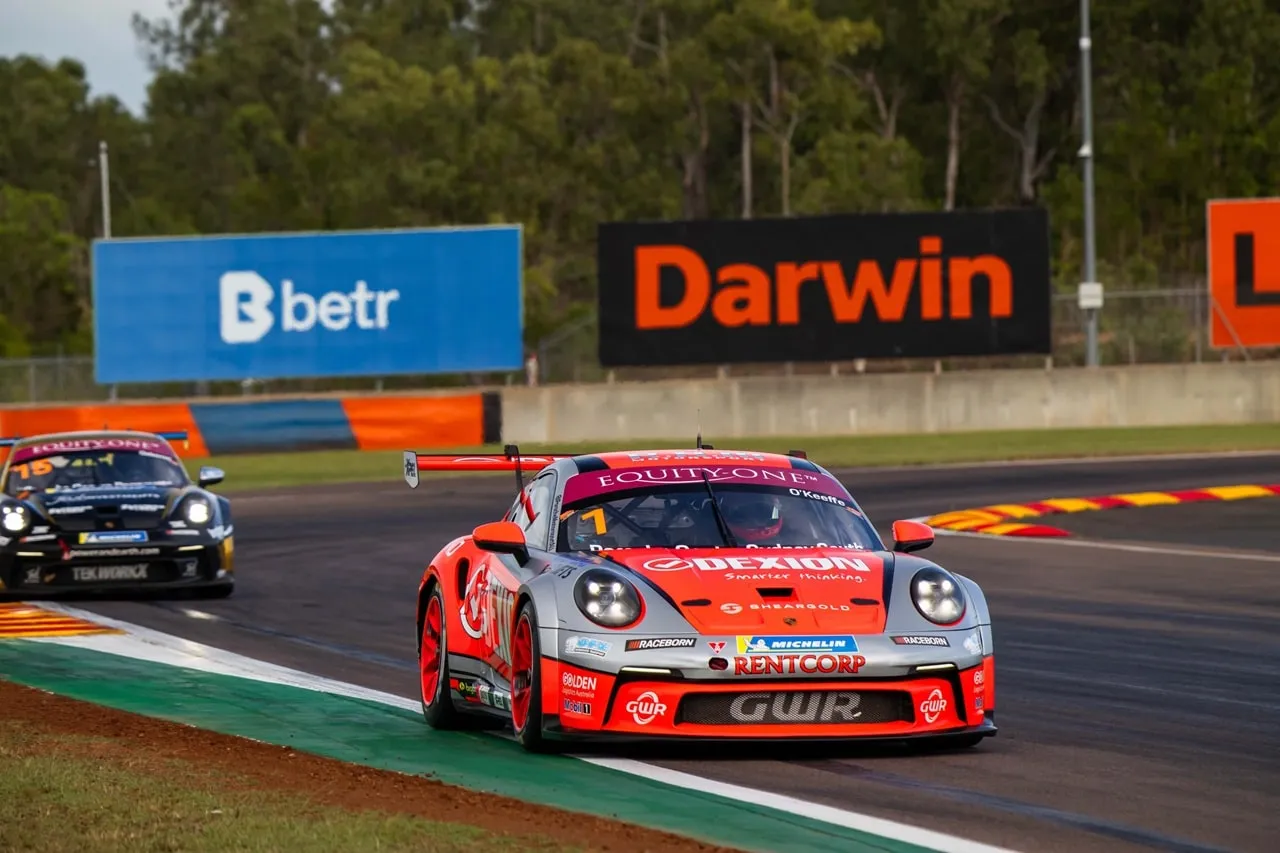 Dexion Porsche GT3 Cup car #1 on track past betr and Darwin signage