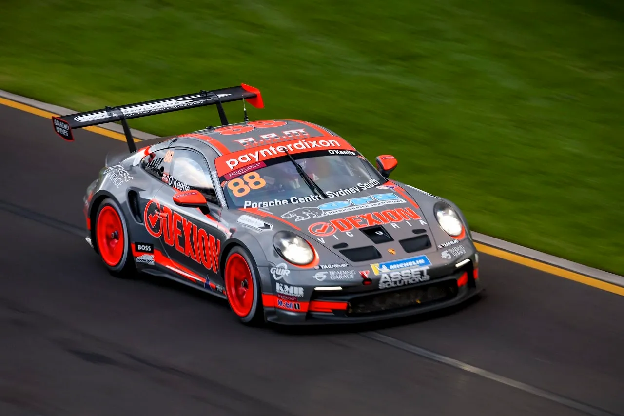 The number 88 Dexion Porsche 911 GT3 Cup car at speed on a wide corner at the Australian Grand Prix